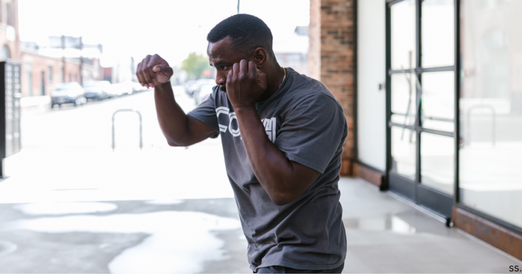 man shadow boxing